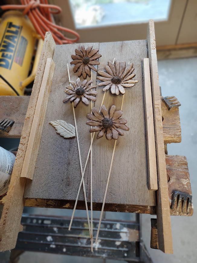 Near final stage of sunflower carvings raw walnut